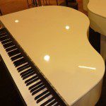 two white pianos